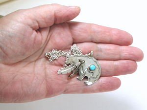 sterling silver and Turquoise bear with feathers pendant