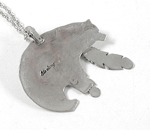 sterling silver and Turquoise bear with feathers pendant