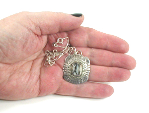 Authentic Native American sterling silver Petrified Wood Pendant by Navajo silversmith Marcella James