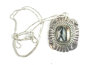 Authentic Native American sterling silver Petrified Wood Pendant by Navajo silversmith Marcella James