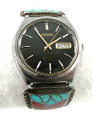 Vintage sterling silver inlay watch tips with expansion band and Seiko timepiece.