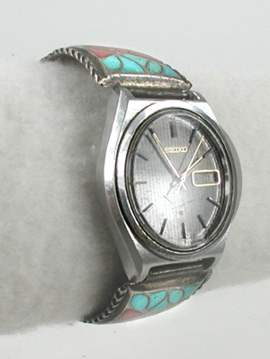 Vintage sterling silver inlay watch tips with expansion band and Seiko timepiece.