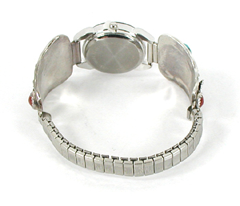 watch tips with turquoise and coral stones with expansion band and Nadia timepiece.