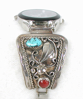 watch tips with turquoise and coral stones with expansion band and Nadia timepiece.