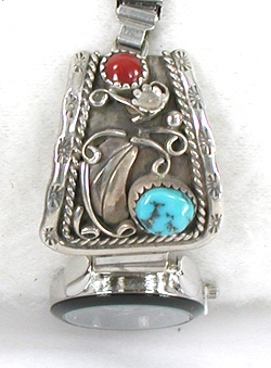 watch tips with turquoise and coral stones with expansion band and Nadia timepiece.