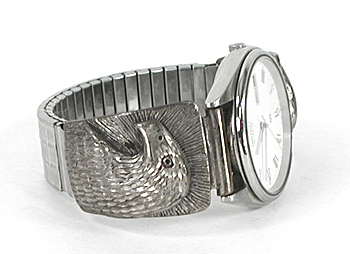 cast sterling silver eagle heat watch tips with Seiko timepiece and expansion band.