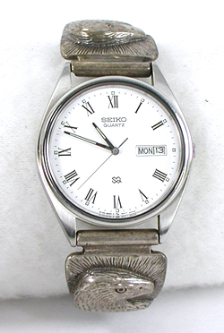 cast sterling silver eagle heat watch tips with Seiko timepiece and expansion band.