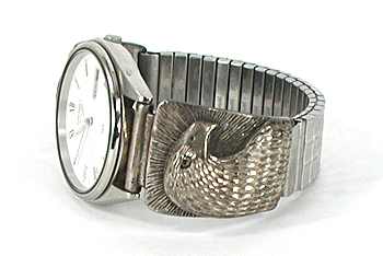 cast sterling silver eagle heat watch tips with Seiko timepiece and expansion band.