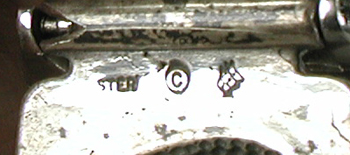 cast sterling silver eagle heat watch tips with Seiko timepiece and expansion band.