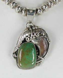 Native American sterling silver Turquoise and Claw Pendant