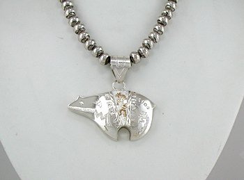 Authentic Native American Navajo  Sterling Silver and Gold Bear pendant