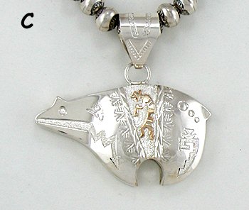 Authentic Native American Navajo  Sterling Silver and Gold Bear pendant