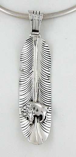 Authentic Native American sterling silver feather Buffalo pendant by Henry Attakai Navajo