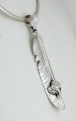 Authentic Native American sterling silver feather Buffalo pendant by Henry Attakai Navajo