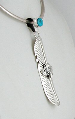 Authentic Native American sterling silver feather Buffalo pendant by Henry Attakai Navajo