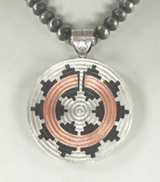 Authentic Native American Sterling Silver and copper large Wedding Basket Pendant by Navajo artist Roland Begay