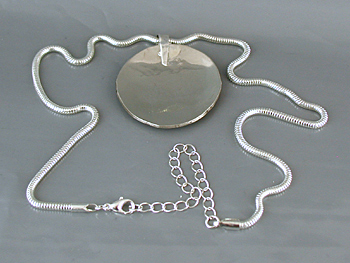 Authentic Native American Indian spotted horse pendant with chain by Lakota artisan Mitchell Zephier
