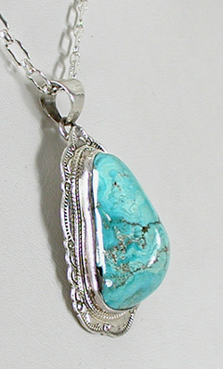 Authentic Native American Indian sterling silver turquoise pendant by Navajo silversmith Joe Piaso, Jr.