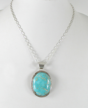 Authentic Native American Indian sterling silver turquoise pendant by Navajo silversmith Lester Jackson