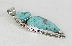 Authentic Native American Indian sterling silver turquoise pendant by Navajo silversmith Lester Jackson