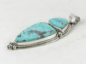 Authentic Native American Indian sterling silver turquoise pendant by Navajo silversmith Lester Jackson
