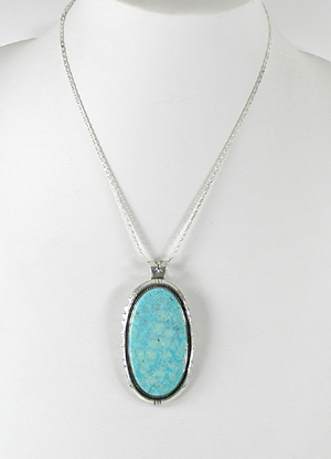 Authentic Native American Indian sterling silver turquoise pendant by Navajo silversmith Joe Piaso, Jr.