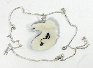 Hand carved bone feather pendant