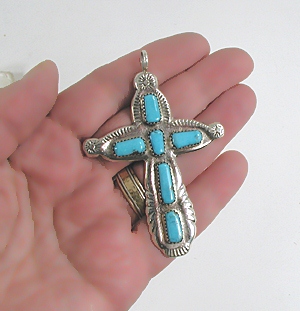 Authentic Native American sterling silver and turquoise cross pendant by Zuni silversmith Marilyn Iule - in hand