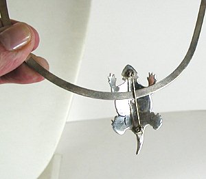 Authentic Native American Sterling Silver and turquoise horned frog pin pendant by Navajo Lee Charley - back view on collar
