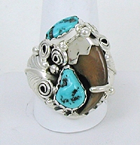 Navajo Sterling Silver turquoise and coral claw  ring