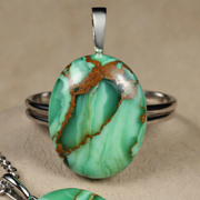 Gaspeite bright neon green stone