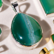 Green onyx smooth translucent uniform stone