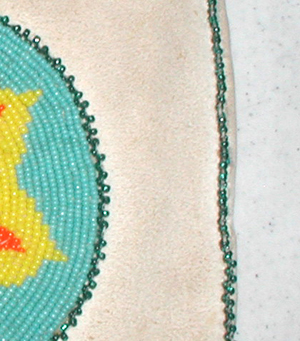 Authentic Native American Indian buckskin beaded medicine bag with two beaded medallions by artisans at Lakota Visions