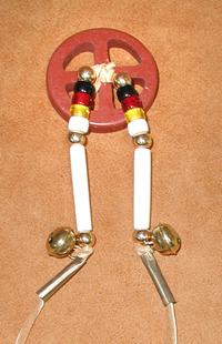 Authentic Native American traditional plains Indian tobacco pouch with sacred catlinite pipestone disc by Lakota artist Alan Monroe