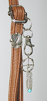 brown PU leather crossbody phone bag with sterling silver medicine bear and ebellishments and tassel zipper pull