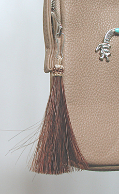 tan PU leather crossbody phone bag with sterling silver Yei and ebellishments and tassel zipper pull