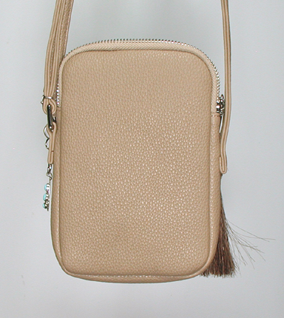 tan PU leather crossbody phone bag with sterling silver Yei and ebellishments and tassel zipper pull
