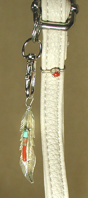 Bone PU leather crossbody phone bag with abalone inlay sunrise badge and ebellishments and tassel zipper pull
