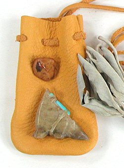 Buckskin medicine bag with Native American animal fetish gemstone and sage
