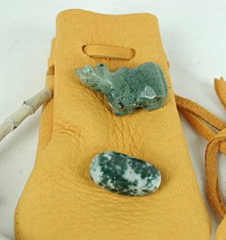 Buckskin medicine bag with Native American animal fetish gemstone and sage