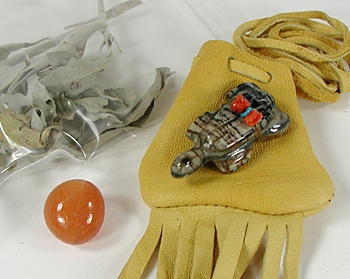 personal buckskin Medicine Bag with animal fetish, polished stone and sage